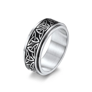Mens Celtic knot spinner ring in silver and black titanium steel for stress relief