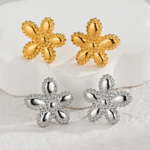 Textured five-petal flower stud earrings in gold and silver finishes on stone base