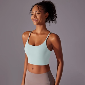 Detailed side view of mint green thin strap yoga tank top with fixed chest pads