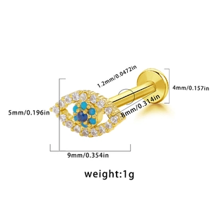Detail showing dimensions and macro view of golden devil eye lip stud piercing jewelry