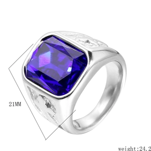 Detailed macro shot of men's stainless steel ring with 21mm purple rectangular gemstone