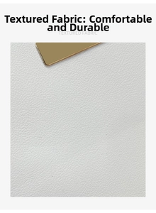 Detailed macro view of white lychee textured leather and gold metal rectangular hardware