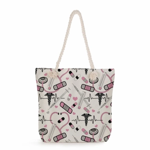 Nurse themed large canvas tote bag with pink medical print and white cotton rope handles
