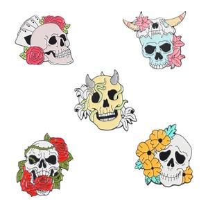Punk style skull and floral enamel pin set featuring roses and cow head alloy badges