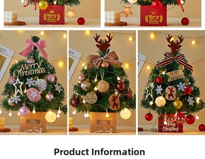 Detail view of mini desktop Christmas tree with LED lights and festive ornaments