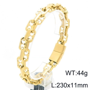 Detail view of gold men's H-link chain bracelet with magnetic clasp and specs