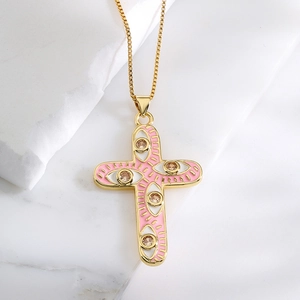 18K gold plated cross necklace with pink enamel eye motif and champagne zircon accents