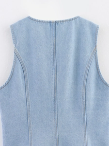 Detail of light blue denim vest back with yellow double-row stitching and twill texture