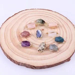 Natural gemstone pendants with gold wire wrapping and faceted crystal pillars