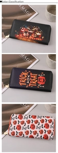 Three Halloween PU leather long wallets with pumpkin prints and zipper closure details