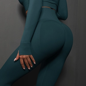 Détail du legging de sport sans couture bleu sarcelle à taille haute et mesh aéré