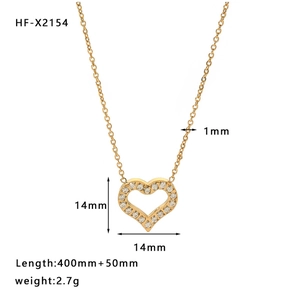 Detailed view of 18K gold hollow heart necklace with cubic zirconia and dimensions labels