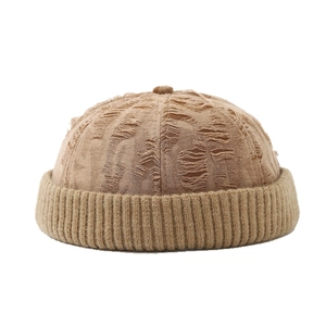 Retro distressed docker hat in light camel canvas with ribbed brim and torn details