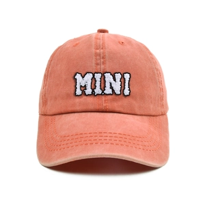 Close-up of MINI embroidery on vintage washed cotton baseball cap for kids