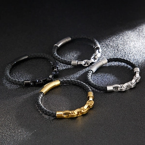 Detailed view of woven leather bracelets with black, gold, silver and gunmetal clasps
