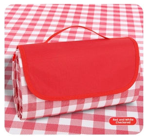 Foldable red and white gingham picnic mat with a durable red carrying handle