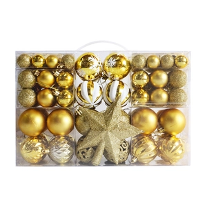 Detail of 6cm golden Christmas ball ornaments set with mixed finishes in a transparent box