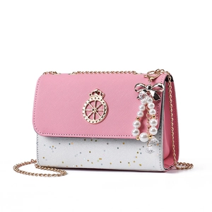Pink and silver gradient crossbody chain bag with star patterns and crown emblem