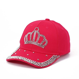 Hot pink denim baseball cap featuring a rhinestone crown design and studded visor detail