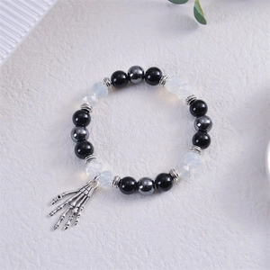 Gothic skull hand bracelet with black natural stones and crystals for Halloween punk style