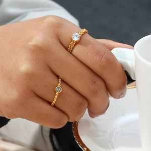 18K gold plated stainless steel open ring set with zircon stones on model's hand