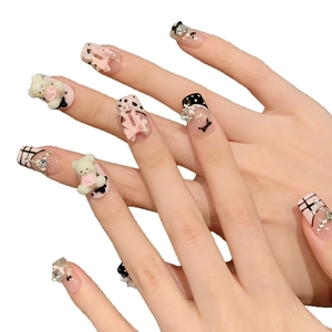 Pink and black handmade press-on nails with 3D resin bears, bows and rhinestone accents