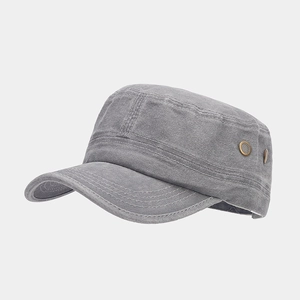 Detail shot of breathable metal eyelets on vintage grey washed cotton cadet cap