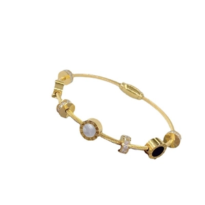 Elegant gold cable bracelet featuring roman numeral charm and sparkling zircon accents
