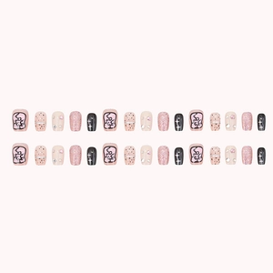 Pink glitter star press-on nails with love graffiti and rhinestone accents in short square