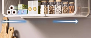 Detail of white metal extendable kitchen shelf showing 64.8cm length for storage