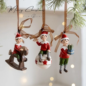 Set of 3 vintage Nordic resin Christmas elf ornaments with rocking horse and gift box