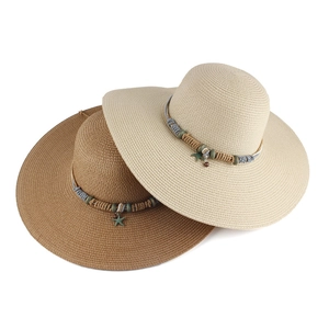 Women's summer straw sun hats with starfish pendants in beige and khaki tones