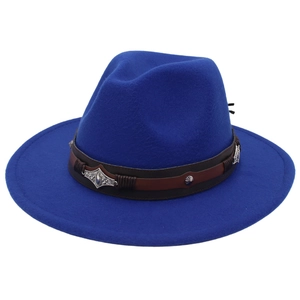 Detail of royal blue fedora hat with wide brim and leather band with metal ornaments