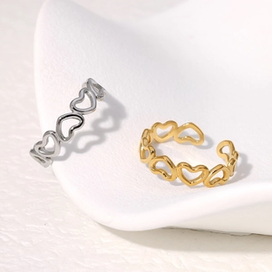 Minimalist heart-shaped open rings in gold and silver finish with hollow-out metal design