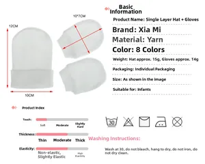 Detailed chart showing white baby knitted hat and mittens set with size specifications