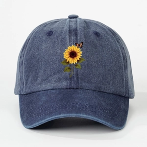 Navy blue washed denim baseball cap with sunflower and butterfly embroidery pattern