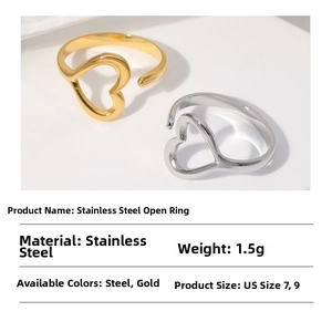 Detailed view of hollow heart stainless steel open rings in gold and silver finishes