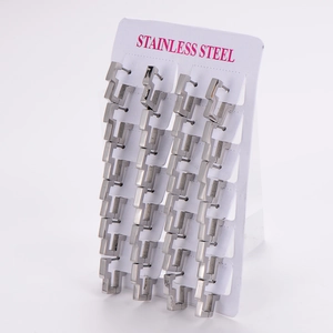 Set of square silver stainless steel geometric earrings displayed on white cards