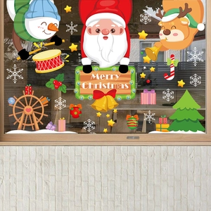 Christmas window decals with Santa, reindeer, and snowman on glass shop door