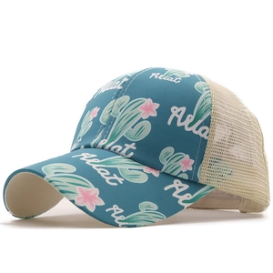 Detail of baseball cap with cactus floral print and breathable mesh back in teal and beige