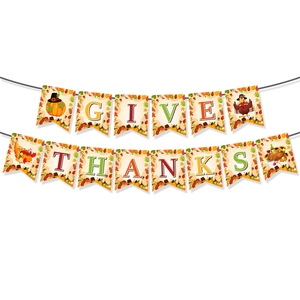 Dettaglio dello striscione Give Thanks con motivi di tacchino e zucca del ringraziamento