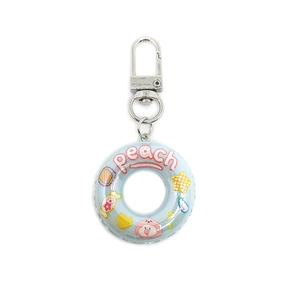 Macro shot of light blue mini lifebuoy keychain with peach print and metal hook