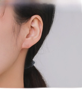 Close-up of S925 silver rectangle stud earring with pink enamel and clear zircon stone