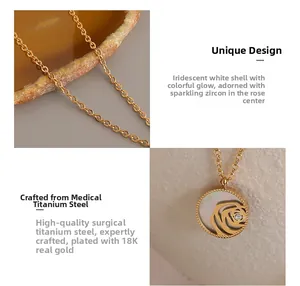Macro detail of 18K gold-plated titanium necklace with rose shell pendant and zircon