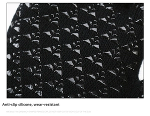 Macro detail of black knitted fabric with anti-slip silicone triangle patterns for grip