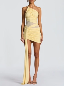 Detail of light yellow one-shoulder mini dress with ruching and side ribbon draping