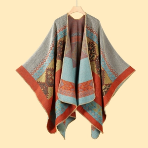 Close-up of ethnic geometric pattern knitting texture and edge stitching on shawl