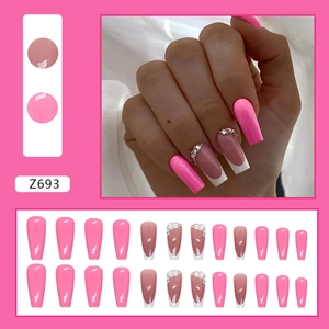 Long pink press-on nails set featuring rhinestone French tips and solid glossy finish