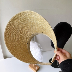 Handcrafted straw sun visor hat with open top and elegant bow for summer outdoor sun protection