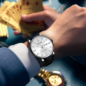 Close-up view of the KIMSDUN men's luxury business quartz watch with dual calendar display